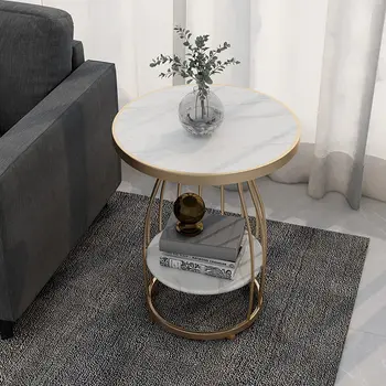 Современная гостиная с каменной плитой диван приставной столик журнальный столик